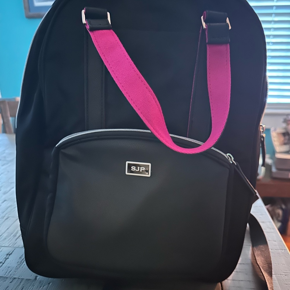 SJP Convertible Backpack Black and Pink By American Tourister